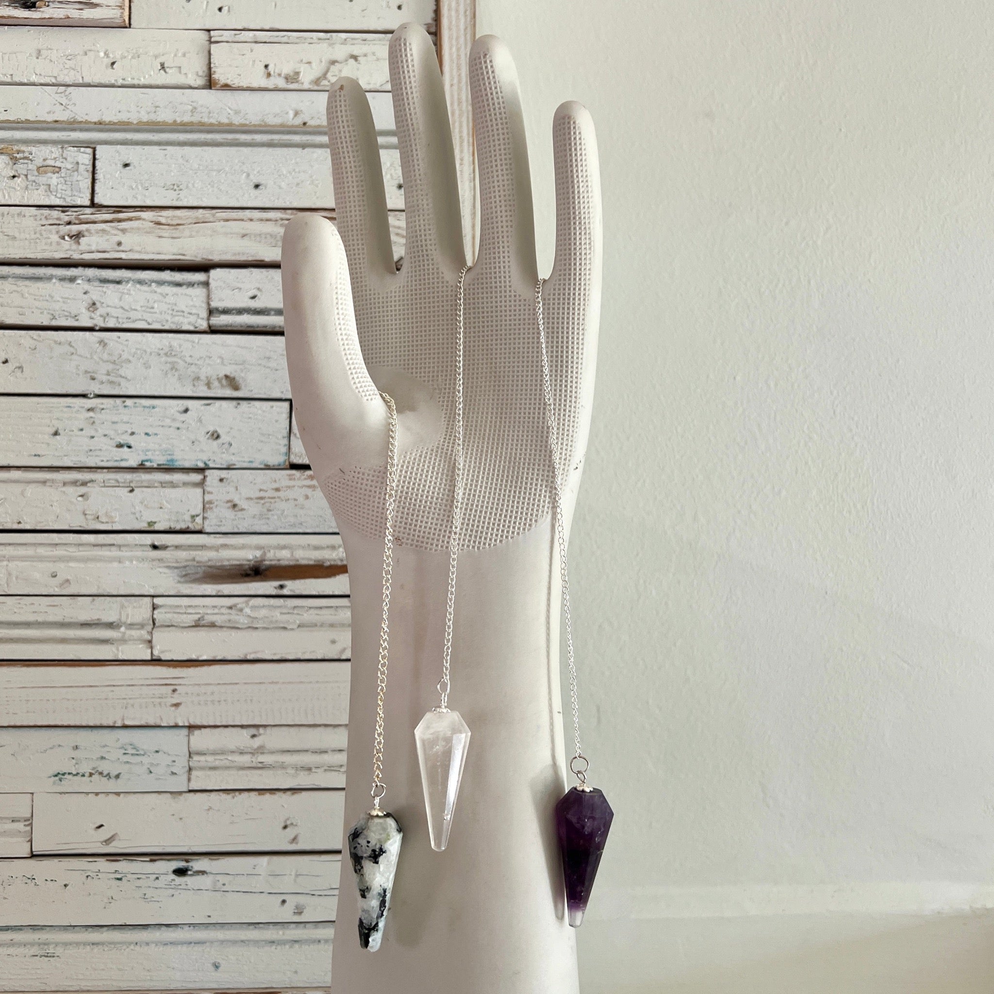 Tap into your intuition with a 12 facet crystal pendulum on a dainty 9" silver chain.  A dowsing pendulum is an object suspended by a cord or chain, used for obtaining information which the normal senses are unable to access on a conscious level.