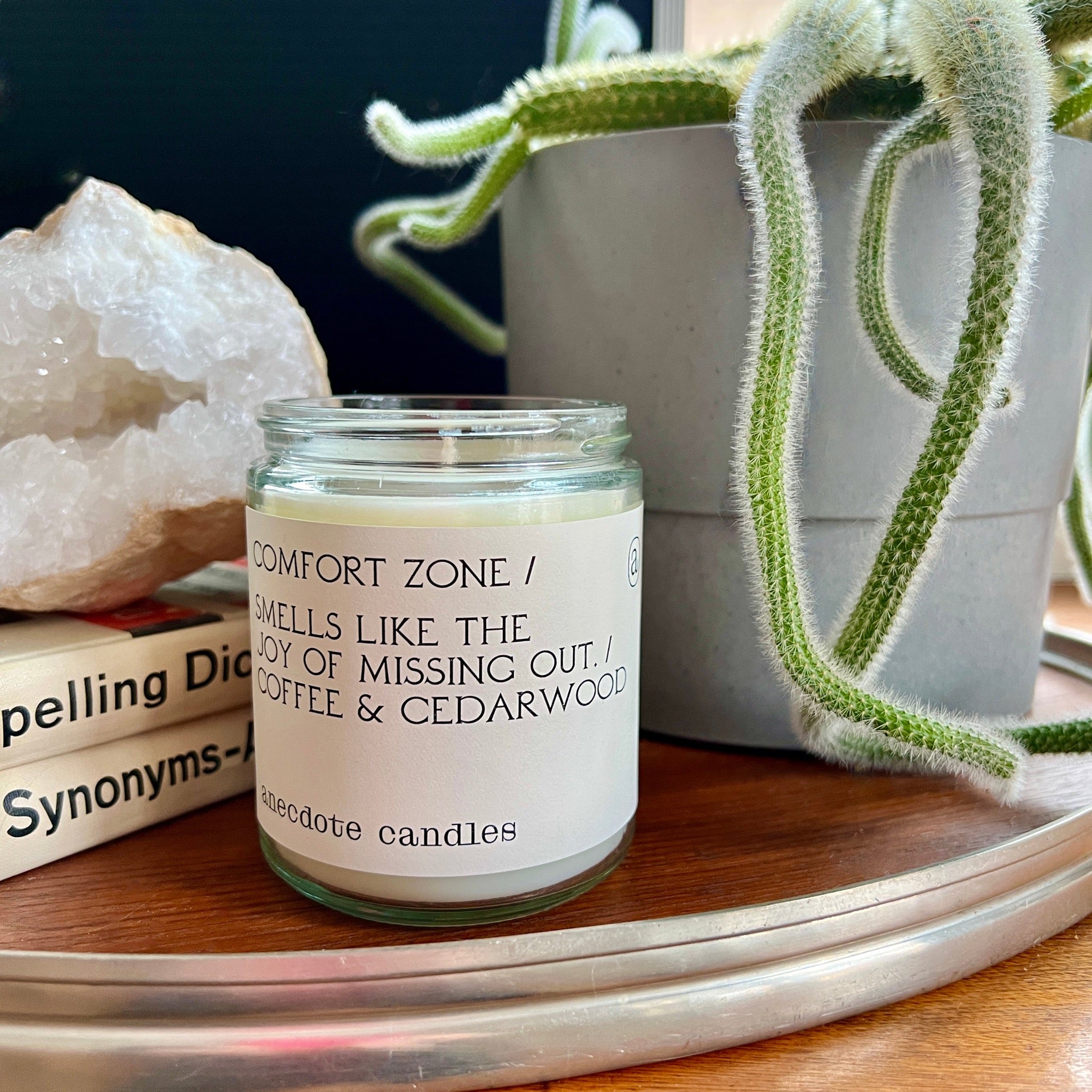 Comfort zone candle smells like the joy of missing out.  Coffee & Cedarwood - Warm and seductive, Comfort Zone is the candle to burn when you want to escape from it all.