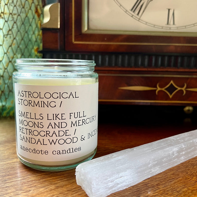 Astrological Storming Candle smells like full moons and mercury in retrograde.  Sandalwood & Incense - If it ever feels like things are going haywire, burn this candle for instant satisfaction.