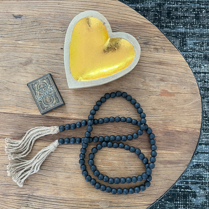 Love is front and center with this mango wood heart bowl.