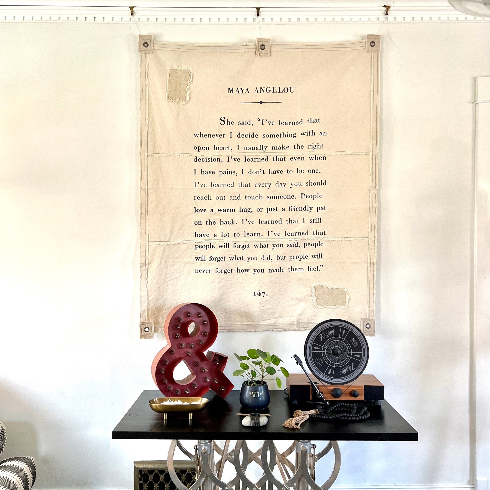 Proudly display this simple yet impactful Maya Angelou wall tarp to remind us how to move about in the world with an open heart.