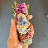 Smudging wands with sodalite are hand-crafted with gorgeous wildflowers, rose petals and eucalyptus.