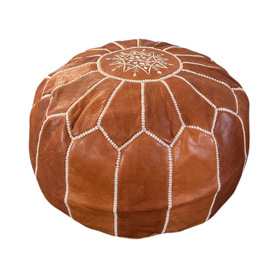 Moroccan leather poufs are handcrafted and hand sewn by artisans in Morocco with goat leather dyed in tanneries that have existed for generations.