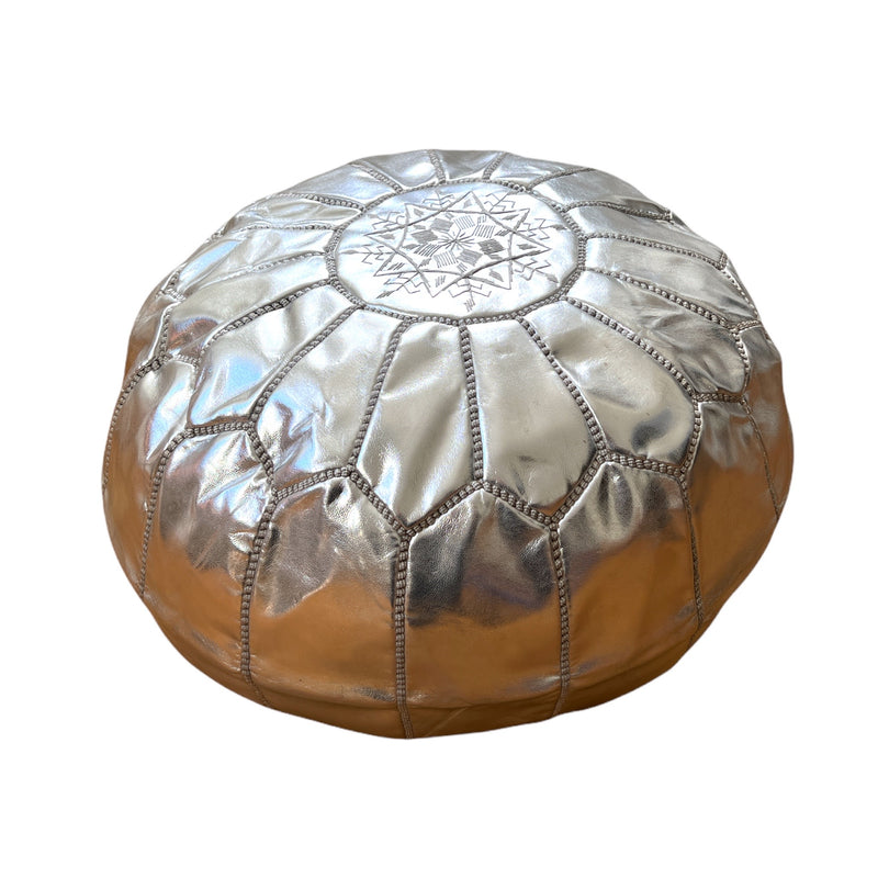 Moroccan leather poufs are handcrafted and hand sewn by artisans in Morocco with goat leather dyed in tanneries that have existed for generations.
