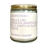 Meditation candle smells like mindful mindfulness.  Palo Santo & Black Cedar - Light this candle and watch your worries melt away. Misted heliotrope, grey quartz, and amber bring clarity and fresh perspectives. Smoky base notes of palo santo and black cedar add depth and texture to the fragrance