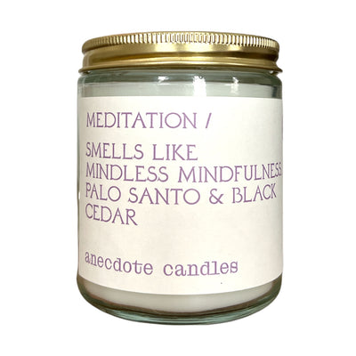 Meditation candle smells like mindful mindfulness.  Palo Santo & Black Cedar - Light this candle and watch your worries melt away. Misted heliotrope, grey quartz, and amber bring clarity and fresh perspectives. Smoky base notes of palo santo and black cedar add depth and texture to the fragrance