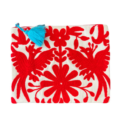 This embroidered Mexican Otomi pouch with colorful tassel will complete your outfit and your day. 