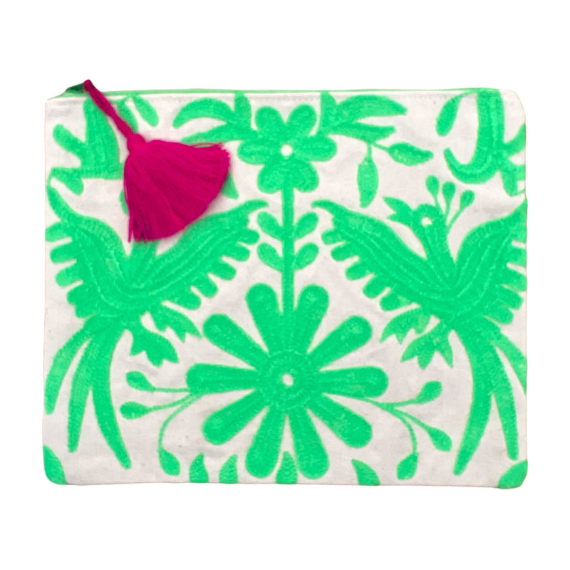 This embroidered Mexican Otomi pouch with colorful tassel will complete your outfit and your day. 