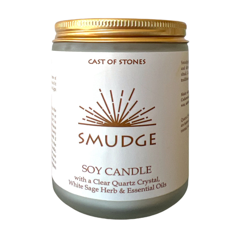 Smudge soy candle with a clear quartz crystal, white sage, and essential oils.