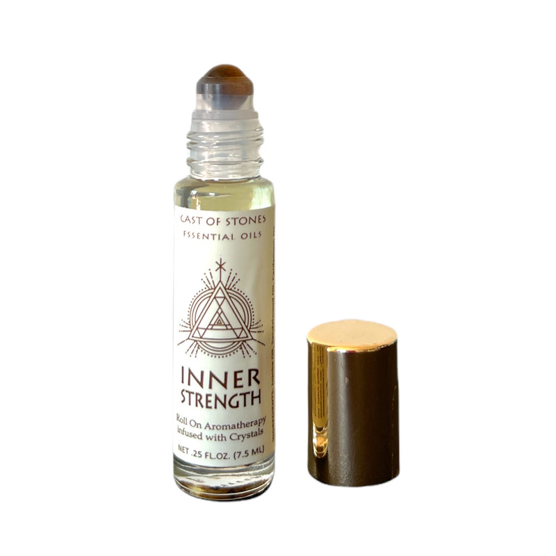 inner strength essential oil roll on aromatherapy with tiger eye crystals.