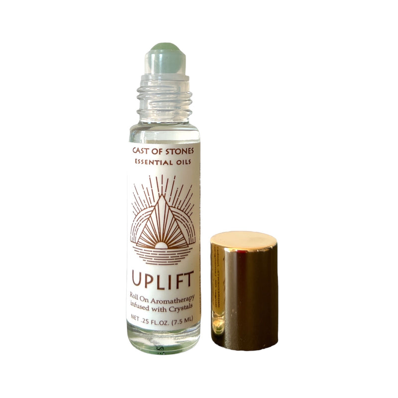 uplift essential oil roll on aromatherapy with green aventurine crystals.