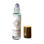 calming essential oil roll on aromatherapy with amethyst crystals.