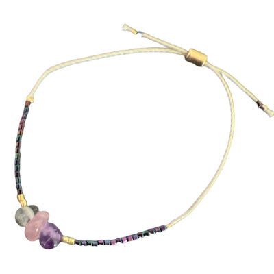  love + happiness iridescent purple beaded bracelet