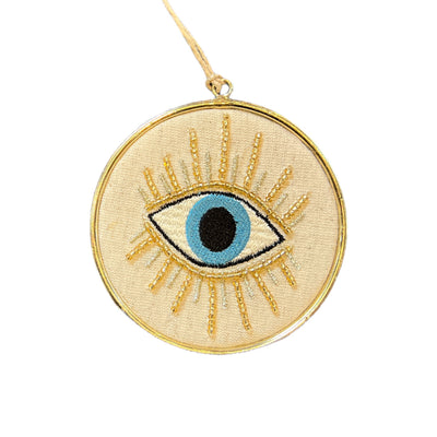 This cream, gold beaded evil eye is an all year ornament to cast away negative energy.