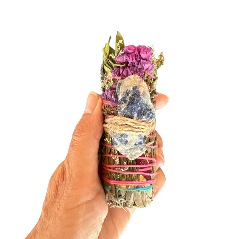 Smudging wands with sodalite are hand-crafted with gorgeous wildflowers, rose petals and eucalyptus.