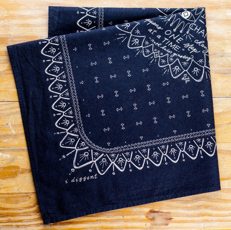 Hand-dyed and printed bandanas to be used as a talisman for personal courage.