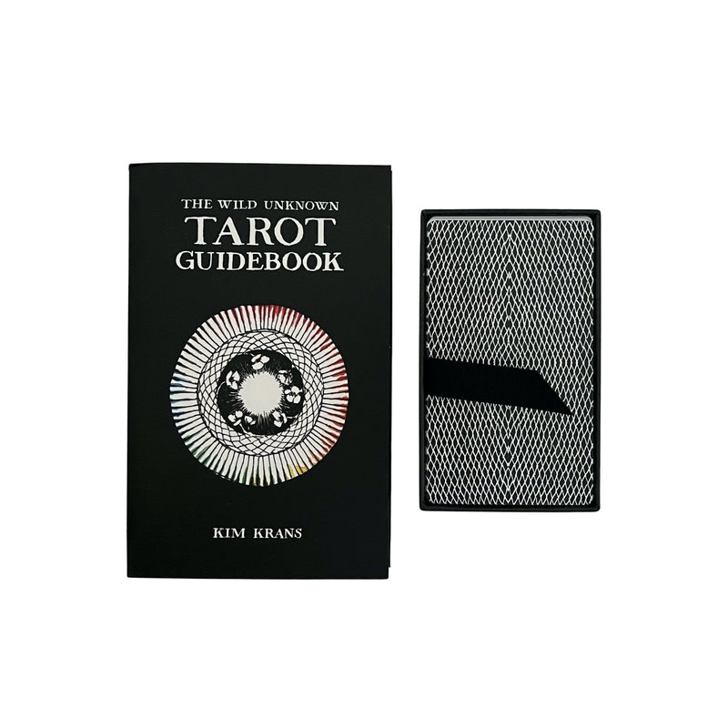 The Wild Unknown Tarot Deck & Guidebook by Kim Krans features 78 intricate cards filled with magic and mystery. Guidebook and deck of cards shown here.