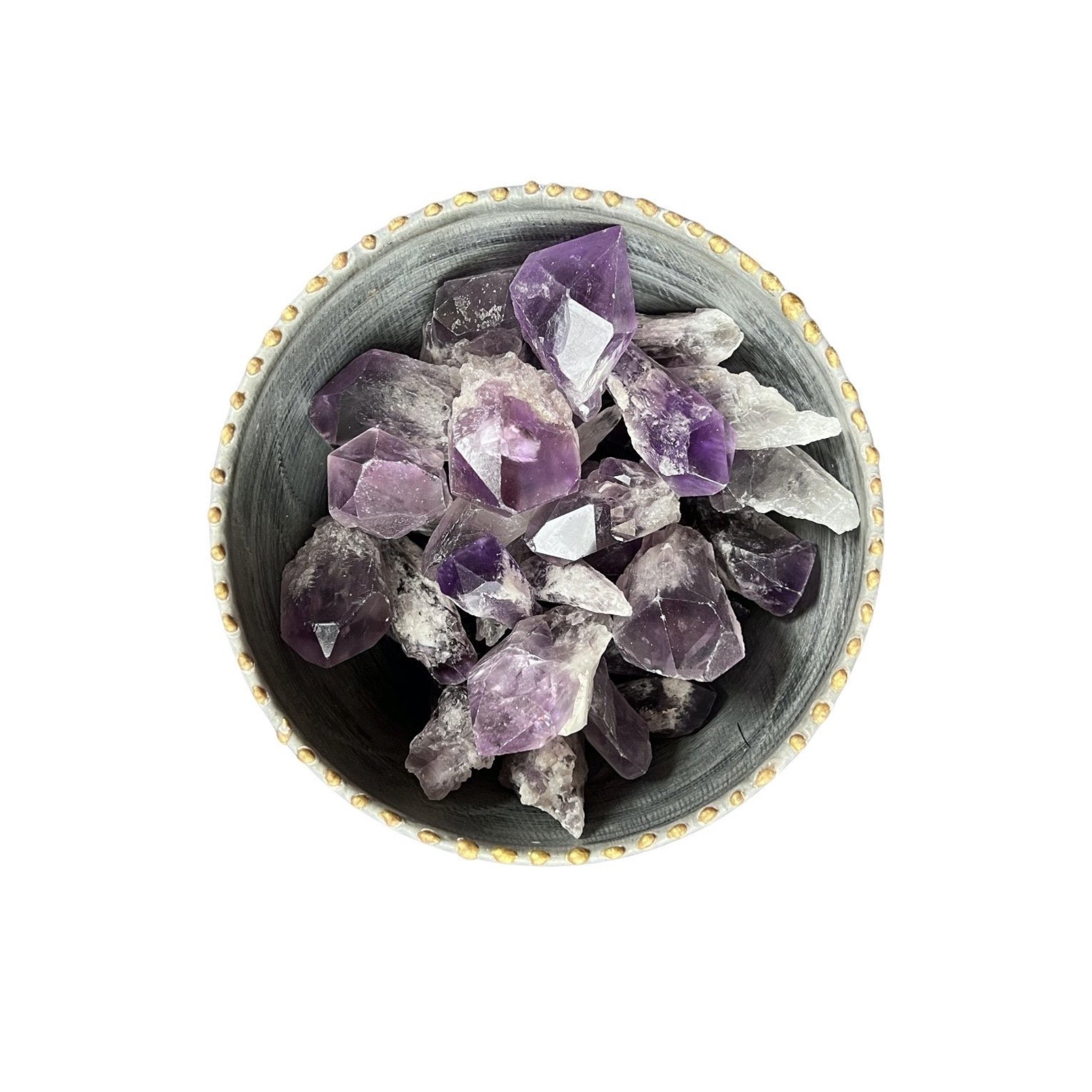 Fascinating raw to point amethyst show the natural formation of this calming crystal.  "inner serenity"  Amethyst inspires a peaceful state of being with soothing energy that relaxes and calms your body and mind. It can increase focus by balancing intuition with logic. It connects you to your consciousness and deepest inner wisdom. Develops a greater trust in your psychic abilities heightening your connection to the divine. Amethyst is a stone of positive transformation releasing negative emotions.