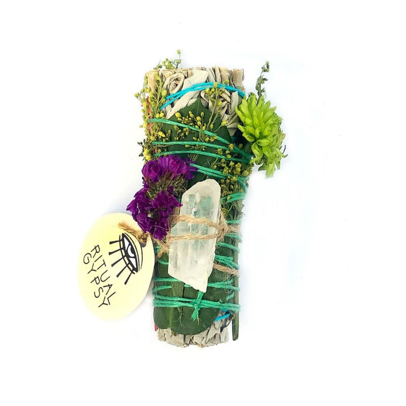 Hand-crafted smudging sage wand with clear quartz crystal and gorgeous wildflowers, rose petals and eucalyptus.