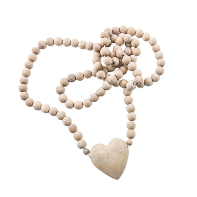 Let love in! Extra large mango heart prayer beads to honor your love and intentions. The ultimate home collection item can be displayed by draping on your coffee table or mantle or hang on a wall for vertical impact.